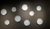 White dishes as wall art.