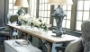 Informal dining with a slightly rustic table and comfortable chairs tucked into a bay window is a great way to start the day. I love the lamps on the table.