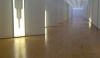 dia1 Dan Flavin's white fluorescent light installation is enormous. You can see the beautiful original floors and get a sense of the scale of the rooms from this photo... taken before I was told that no photos are allowed.