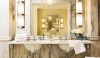 As-seen-on-ThePerfectBath.com-Pinterest-Page-2 Calacatta marble slabs create this beautiful installation. The stone flows naturally and the colors are soft . This is a fine representation of the material.