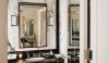 As-seen-on-ThePerfectBath.com-Pinterest-Page-3 Strong gray veins on a clean white ground create a strong wall surface. The black painted moldings accent the architecture and frame the stone.