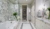 image001 A well balanced space using a stone with a very active surface that feels natural . The complimentary gray floor border defines the space.