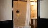 ace-hotel-new-york-bath-2 This is a great installation of a 6 x 6 brick bond installation with light gray grout. You can experience this room at the Ace Hotel, NYC.