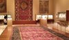 image (5) A room of rugs, one more beautiful than the next. Decoration is remarkably detailed either geometric or floral.